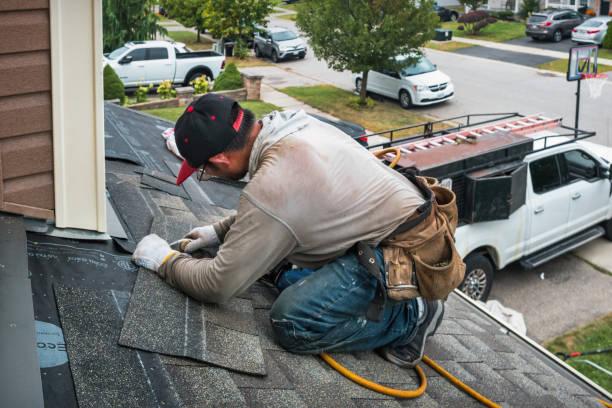 Professional Gutter Repair And Installation technician working in Hope, RI